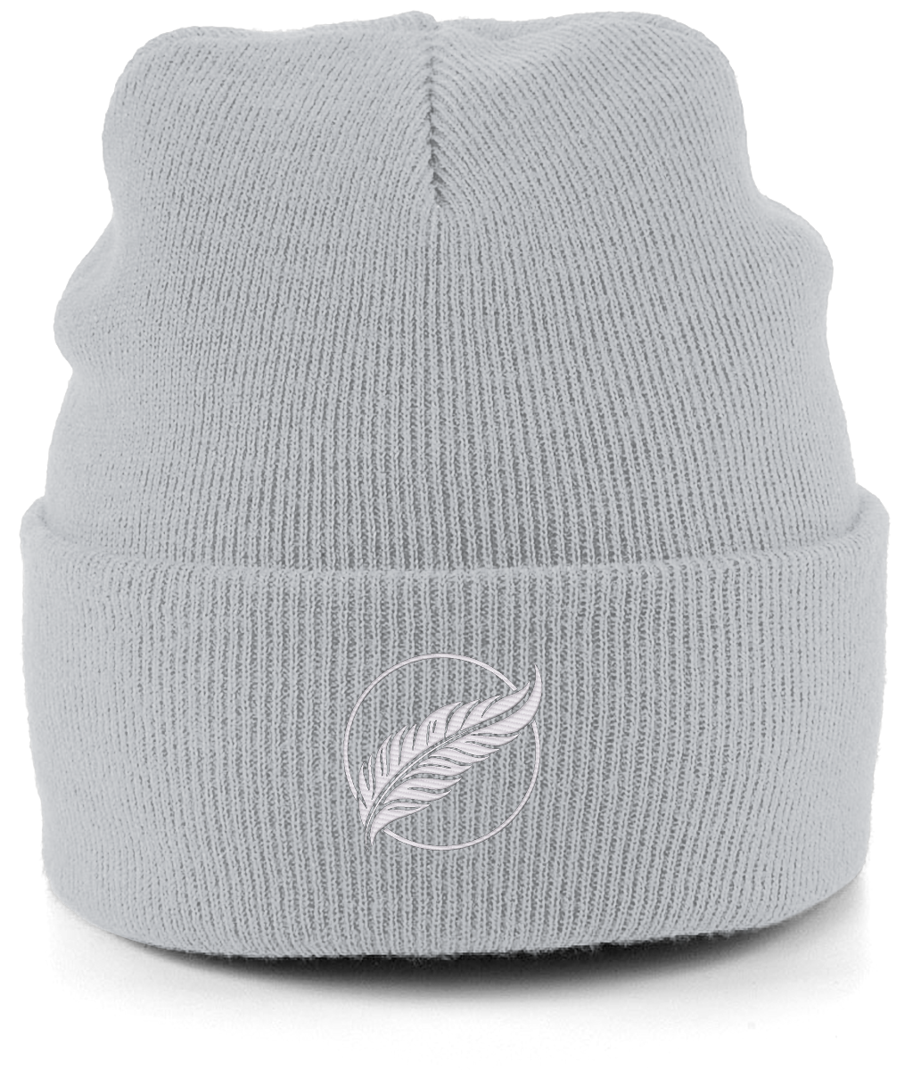 Roho Rafiki® embroidered icon organic cotton beanie. Crafted from 100% organically-sourced Control Union Certified cotton, this lightweight design in a heritage-inspired fine rib is the perfect all-year-round option for casual headwear. Embroidered with the white feather icon logo. A range of colours are available. Sand.
