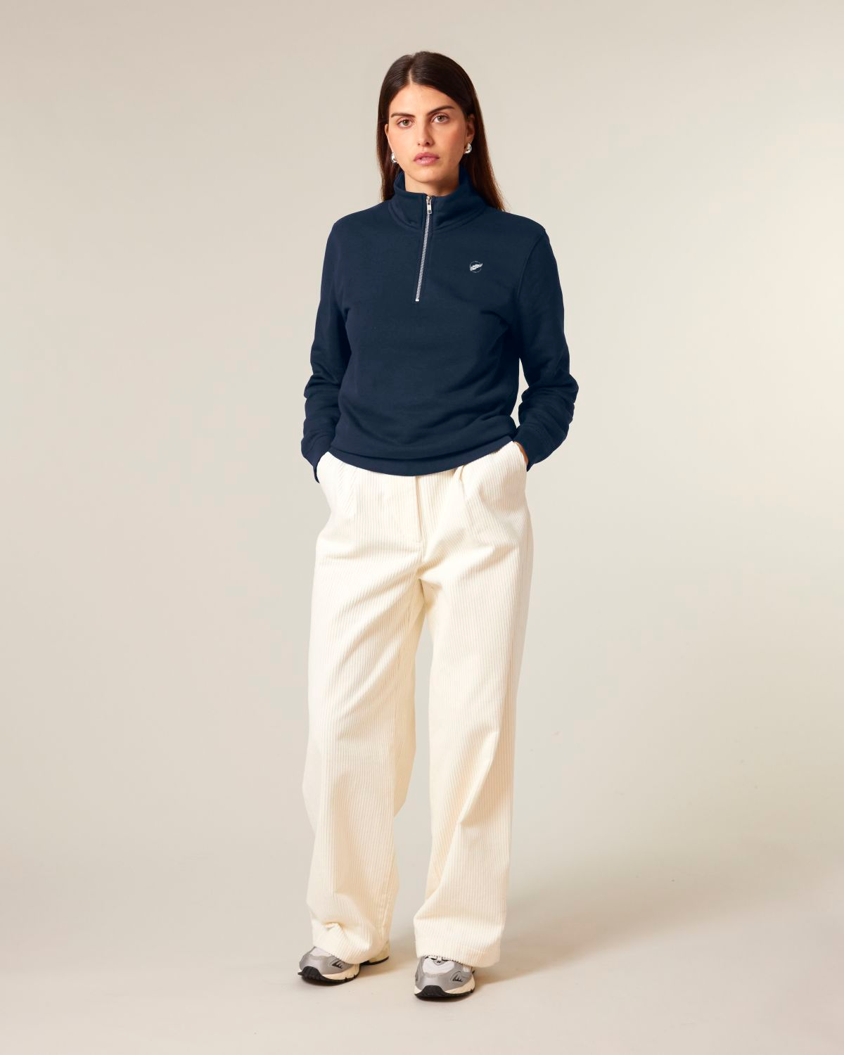 The Roho Rafiki® embroidered unisex quarter-zip sweatshirt is made with organic cotton and recycled polyester and is a sleek, stylish and quality finished garment. French Navy.